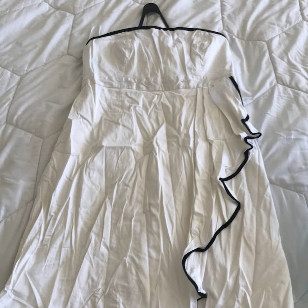 Black and White strapless short dress.